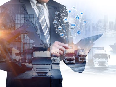 The double exposure image of the businessman using a smartphone during sunrise overlay with Logistics and transportation of Container Cargo ship and Cargo plane